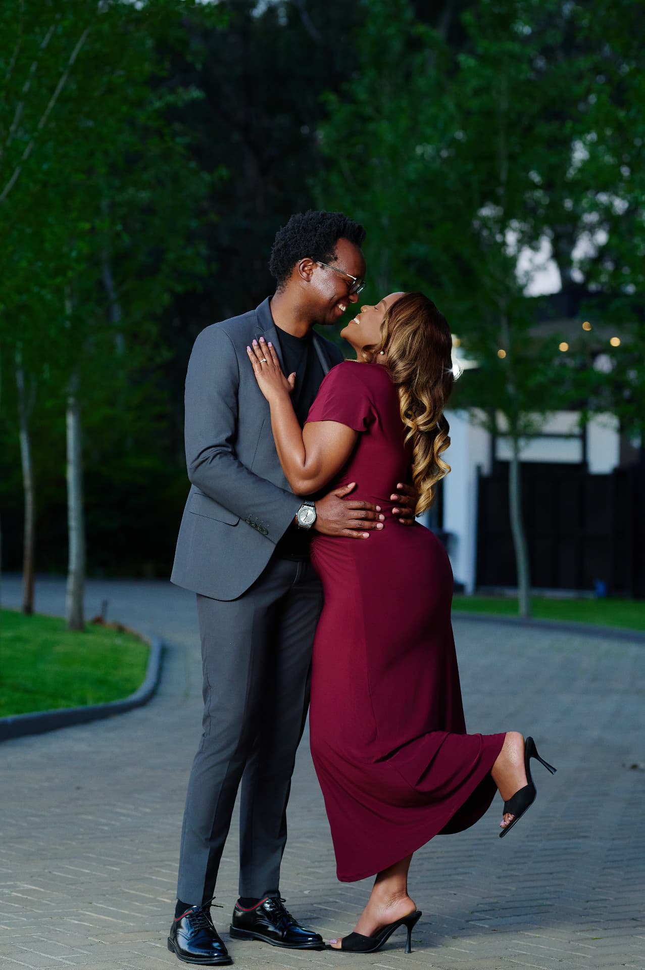 Neliswa and Sivuyile embracing and laughing